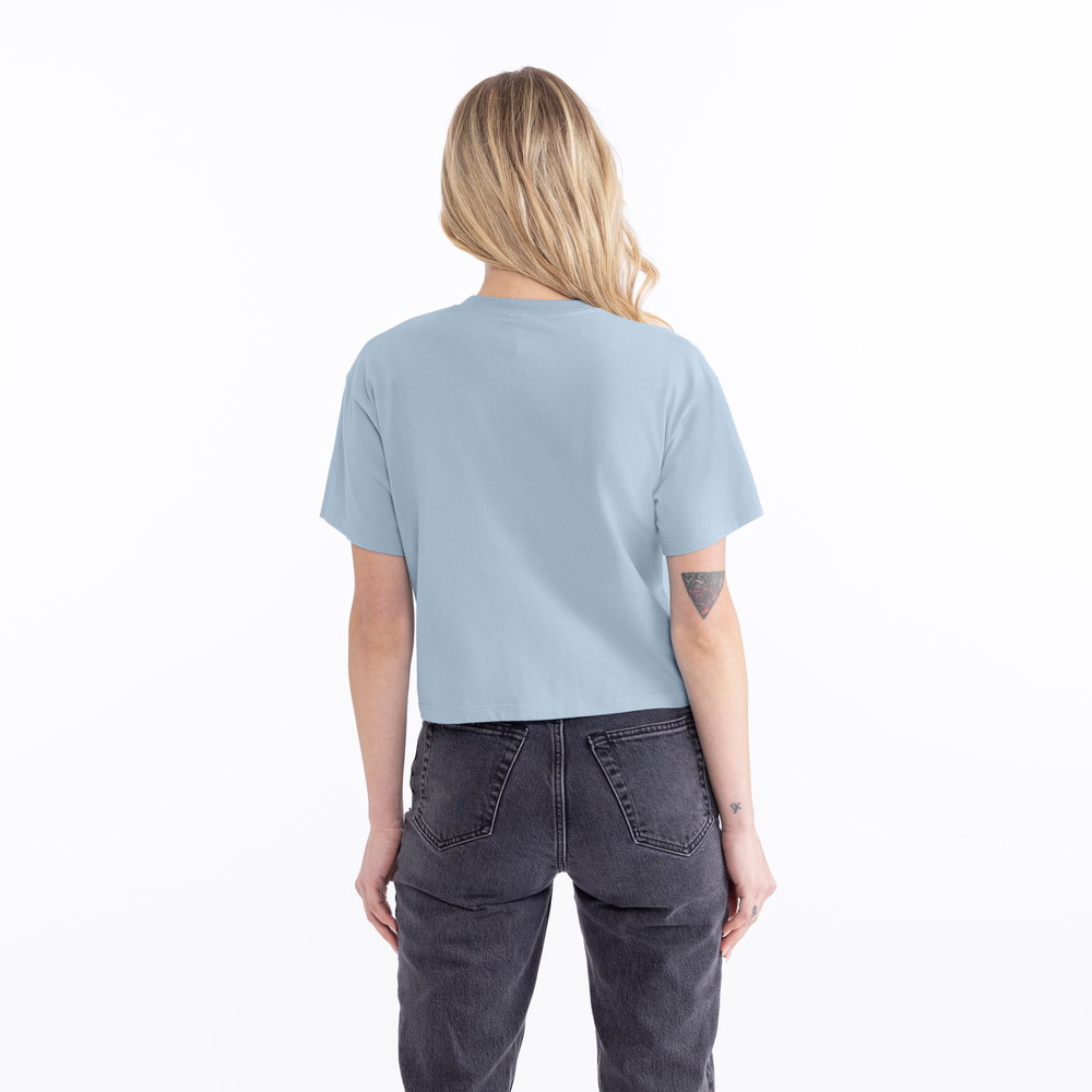Inspired by the casual and cool vibe of Southern California, this crop has a modest cut and a length that hits just below the belly button with a finished hem and neck binding. This silhouette is perfect to elevate your everyday casual wear.