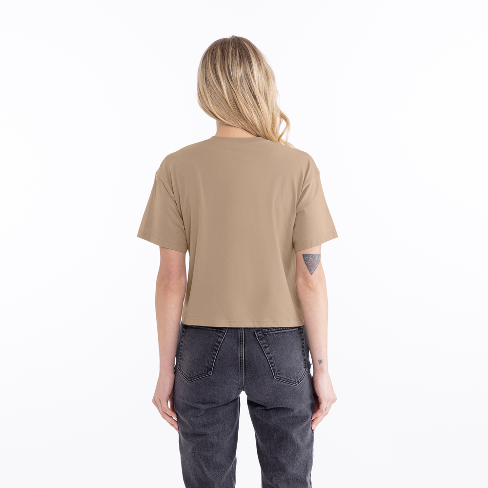 Inspired by the casual and cool vibe of Southern California, this crop has a modest cut and a length that hits just below the belly button with a finished hem and neck binding. This silhouette is perfect to elevate your everyday casual wear.